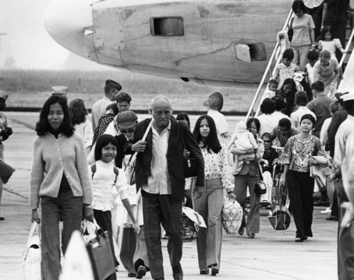 Refugees from Vietnam arriving at Camp Pendleton by plane.