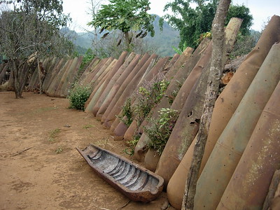 Bombshells left over from the US secret bombing during the Vietnam War, lined up in a village outside Phonsavan.