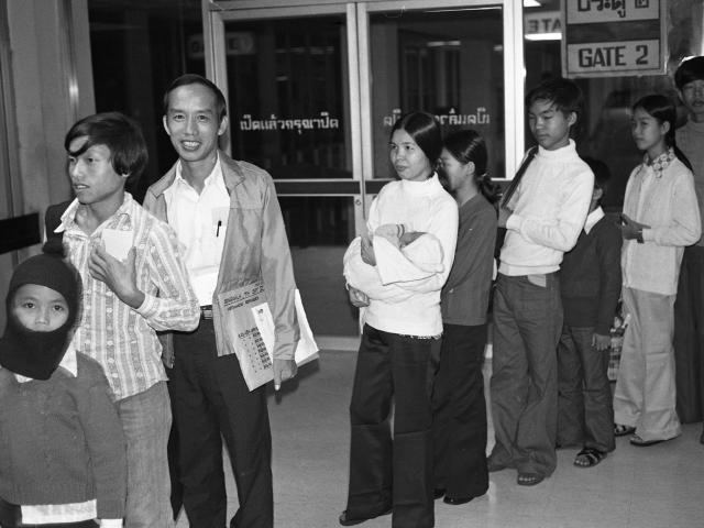 Vietnamese refugees going through Bangkok airport in 1977 from Rich Kocher Collection.