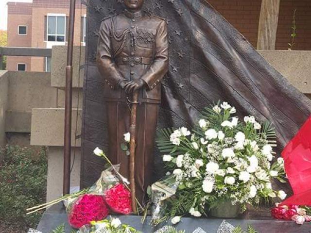 Image of the unveiling of the statue of General Vang Pao statue at Chico City Hall. Photo taken by Ger Thao on September 12, 2015.