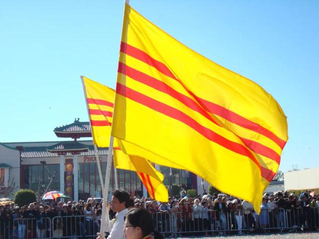 Ethnic Vietnamese fly the flag of former South Vietnam in Orange Country, California.