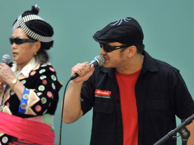 A unique, live performance mixing spoken word by Tou Saiko Lee, and traditional music sung by his grandma, Youa Chang.