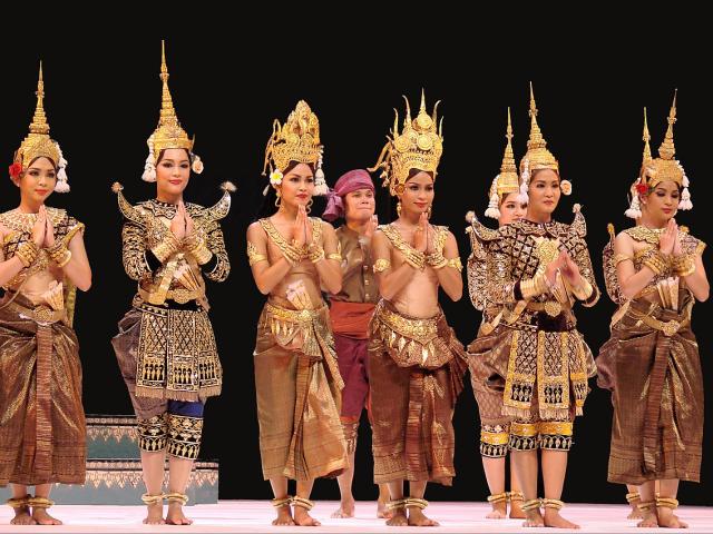 A Cambodian dance company, known for its luxurious costumes and accessories decorated in gold and silver, accompanied by a soft dancing style.