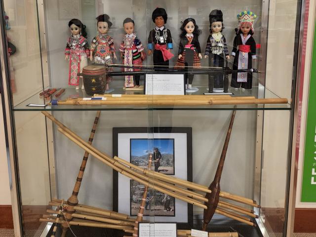 Display of traditional Hmong instruments, such as the qeej and flute. Taken at the Center for Hmong Studies at Concordia University by Ger Thao, 2022.