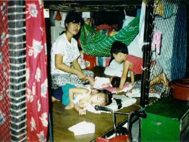 Family in their cubicle. 1987