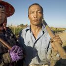 Hmong farmer Ka Nou Vue and his wife Chong Xiong photographed at their west side farm in Fresno, CA. Photo by Tudor Stanley (2008) for Yang Design.