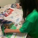 Ella Williams Designing her 3D Diorama of a Traditional Miwok Home.