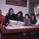 First generation Hmong children in the mid 1980s listening to a Catholic priest read “Where the Wild Things Are.” 