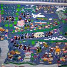 Story Cloth depicting Hmong life across Laos from Hmongstory Legacy Collection.